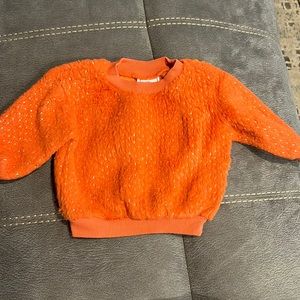 Baby girl orange sweater with golden glitter dots. Size 6-9months.